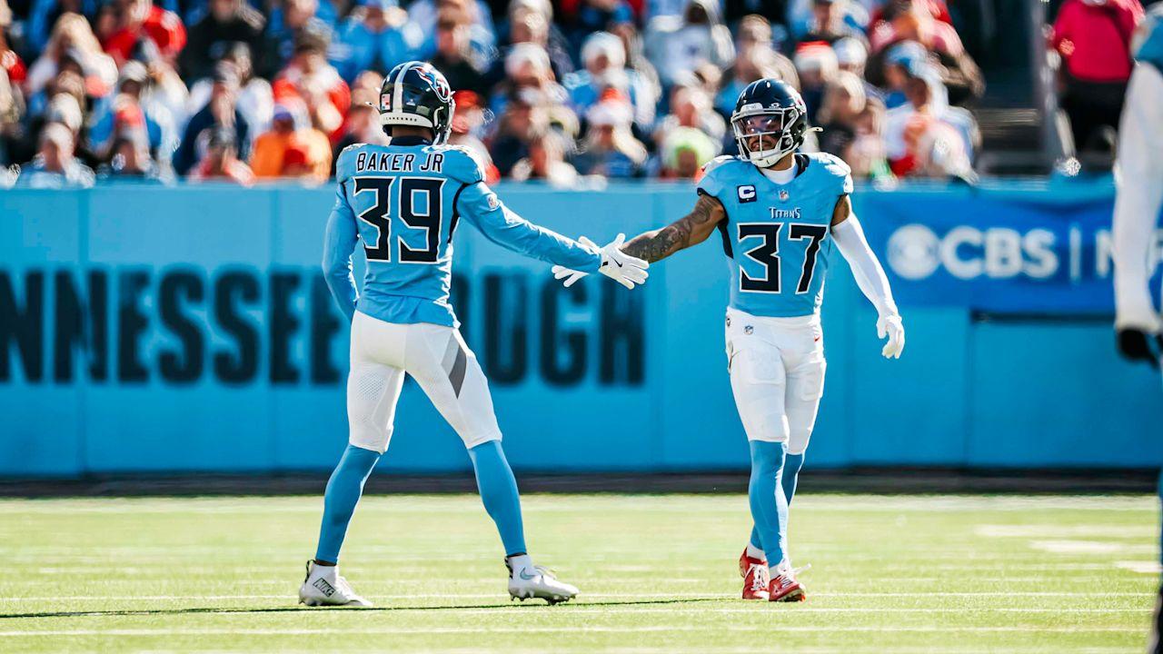 Two football players meeting on the field